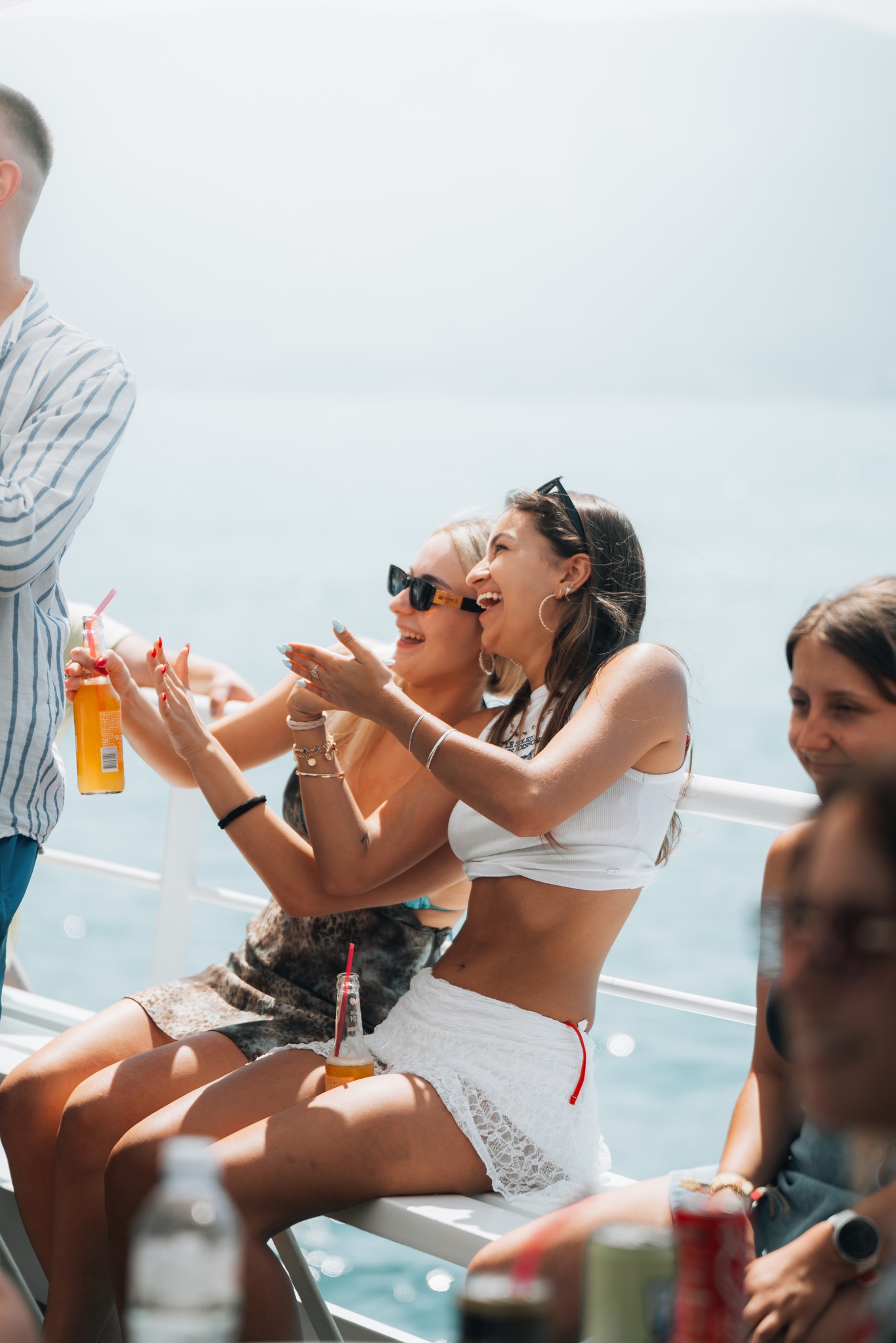 Happy guests on a boat trip in the Bay of Vlora